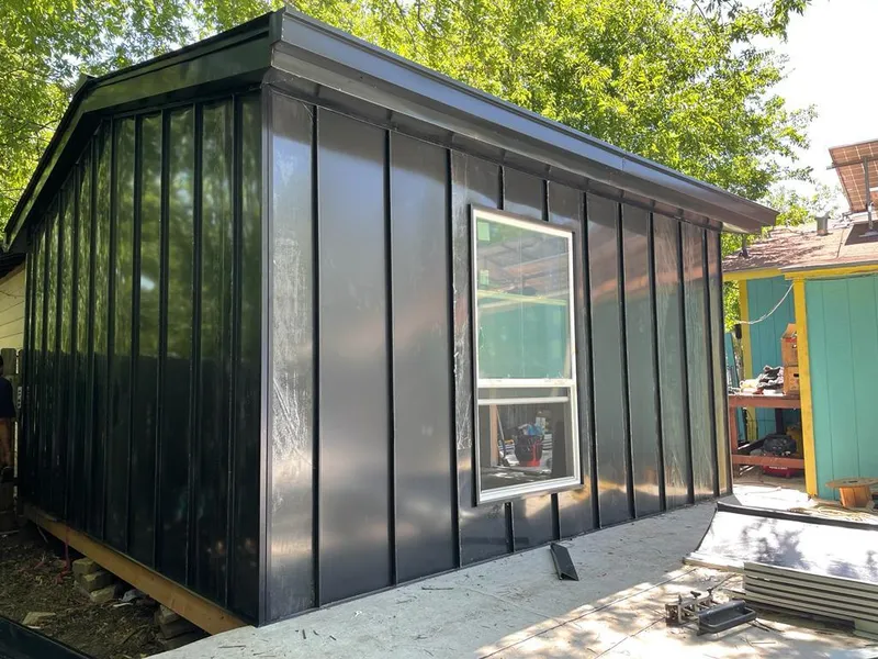 Black standing seam metal wall panels for Roof Inspection in Maywood