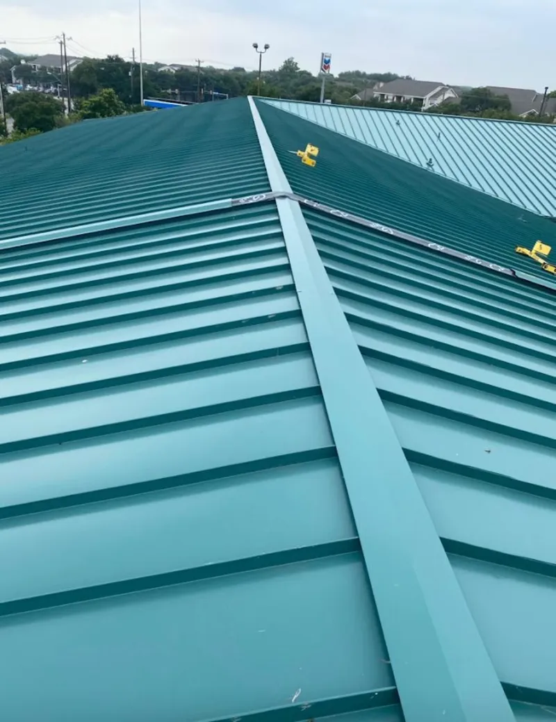 Green commercial metal roof ridge and valley for Metal Roof Repair in Maywood
